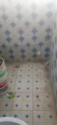 A dirty bathroom floor