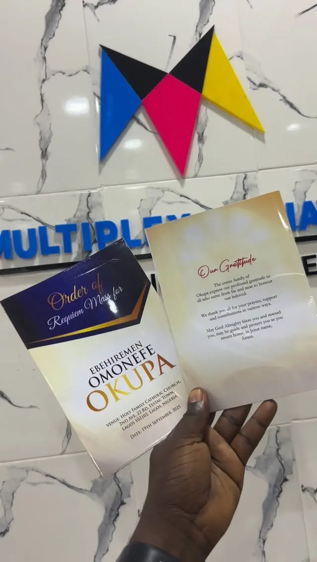 Printed invitations held in front of the Multiplex logo wall