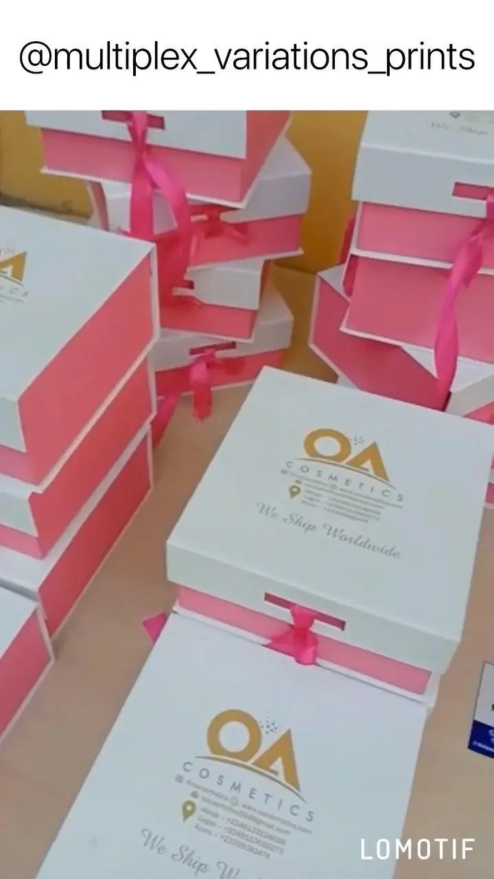Pink and white branded boxes